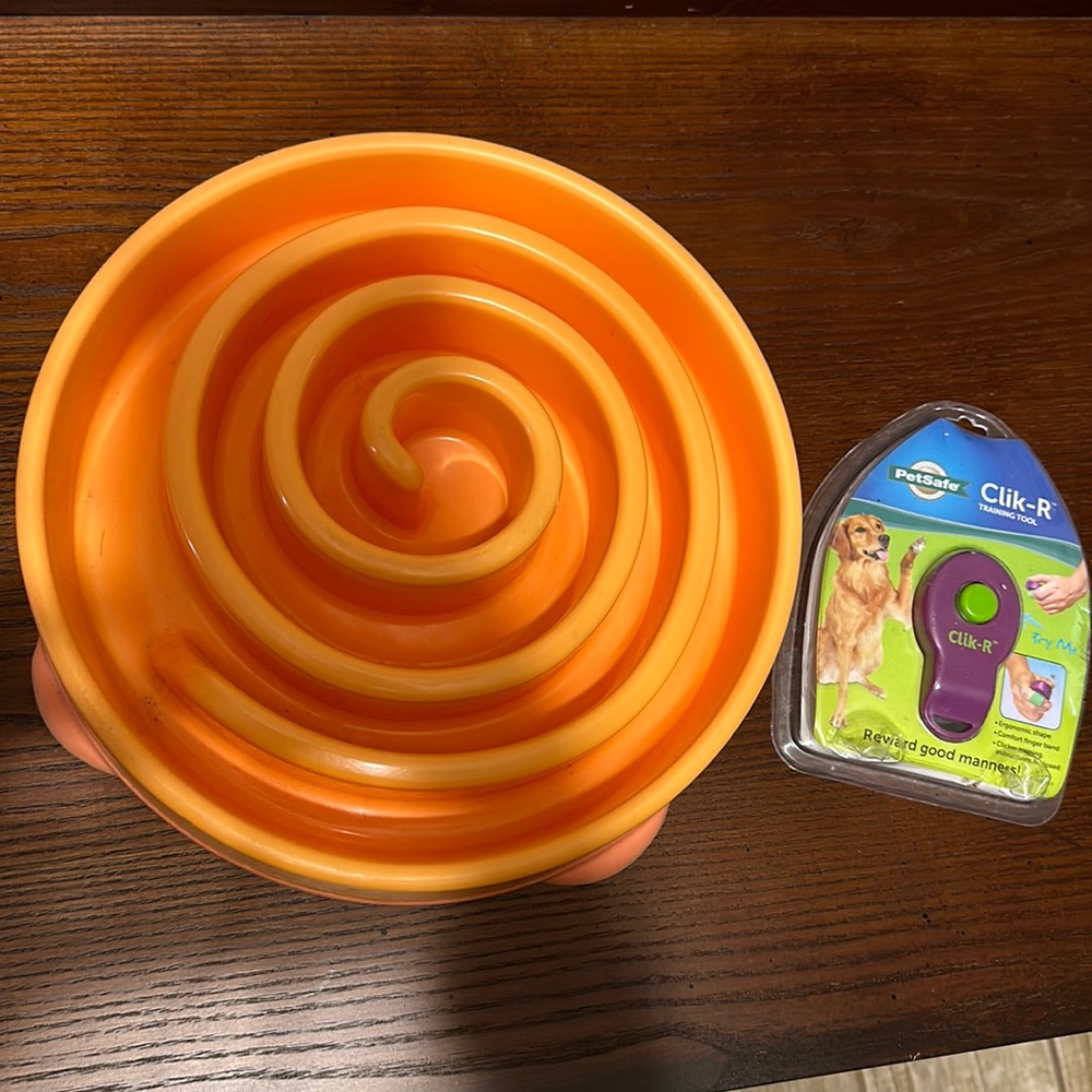 Dog bowl to train your dog to eat slower and a Clik-R training tool.